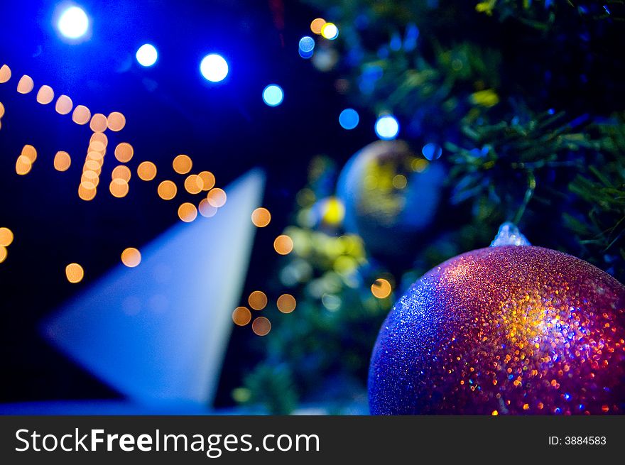 Close-up of Christmas Tree with red and gold ornaments and lights