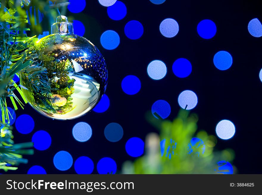 Close-up of Christmas Tree with red and gold ornaments and lights