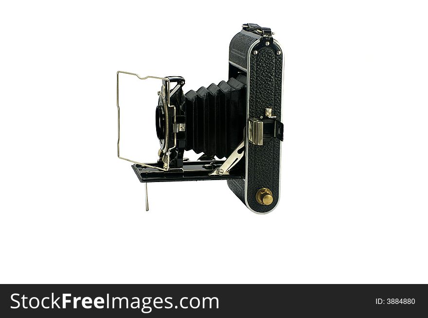 Old camera isolated on the white background. Old camera isolated on the white background