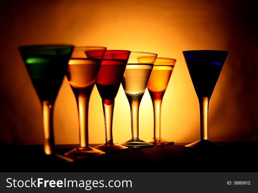 Six colored glasses in the light