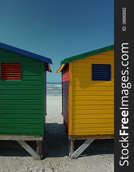 Famous changing huts for bathers on the beach at Muizenberg. Famous changing huts for bathers on the beach at Muizenberg.