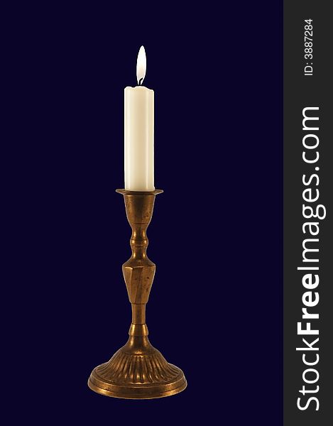 Candle-light with candelabrum isolated on dark blue.