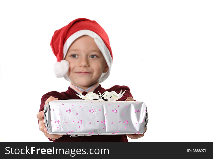 The boy in a cap Santa with a gift on a white background