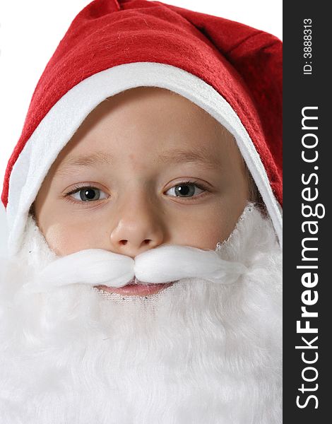 Portrait of the child in a red hat close up