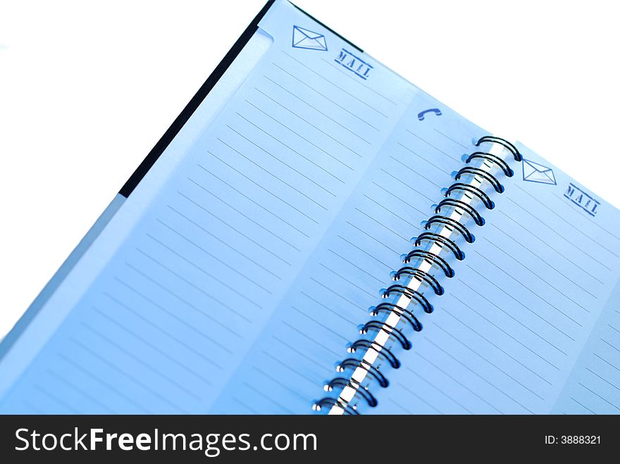 A blank page in a spiral bound notebook, with clipping path. A blank page in a spiral bound notebook, with clipping path.