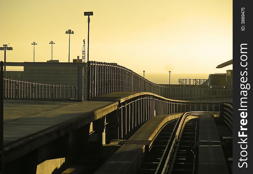 Sunrise as the weary road warrior takes the train to the terminal at SFO. Sunrise as the weary road warrior takes the train to the terminal at SFO.