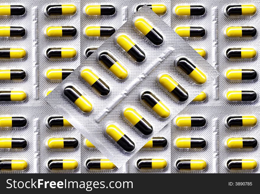 Yellow And Black Medical Capsules