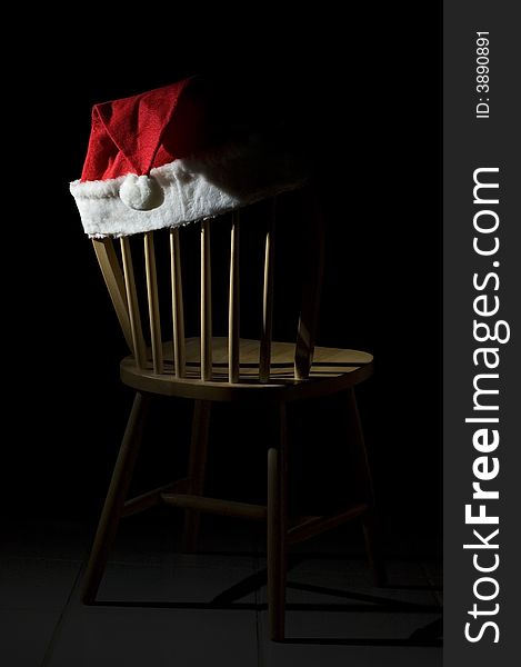 Santa hat left on the chair. Santa hat left on the chair