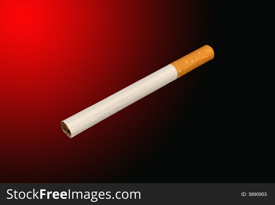 A Isolated Cigarette on a red and black background