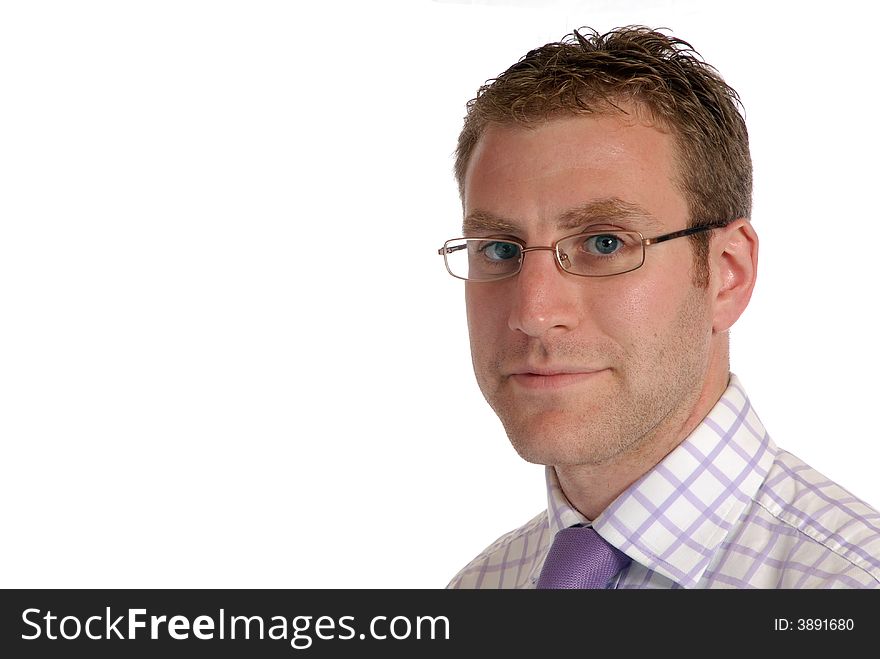 Young businessman, wearing spectacles, check shirt & lilac tie, isolated on white, room for text. Young businessman, wearing spectacles, check shirt & lilac tie, isolated on white, room for text