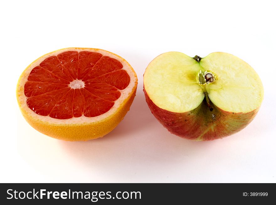 Fresh orange and apple on white background