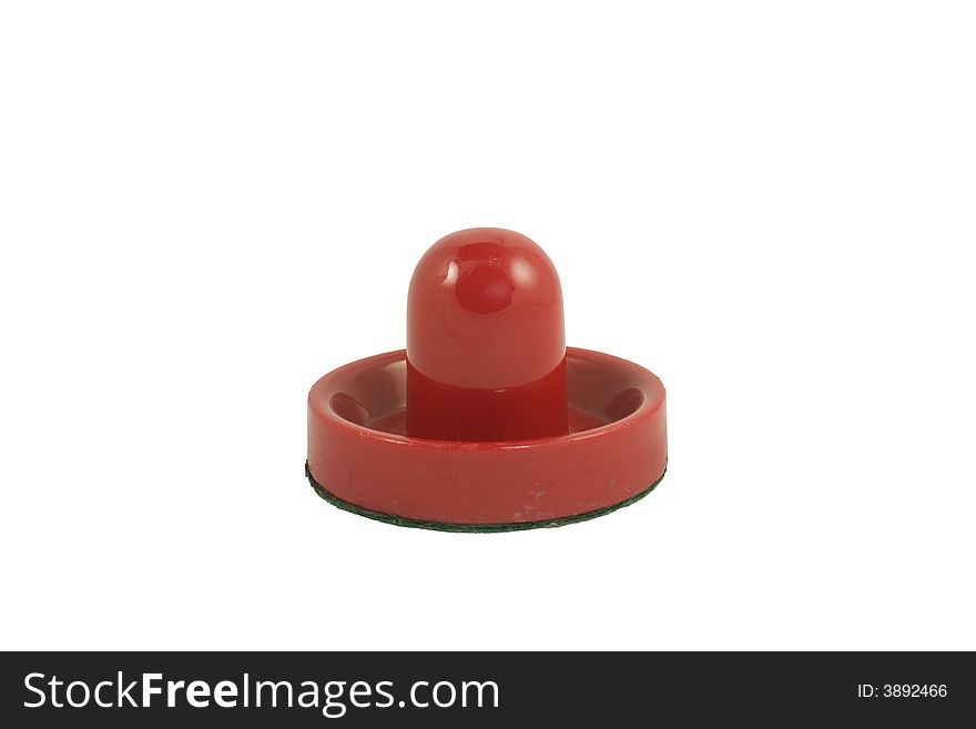 Isolated red air hockey mallet