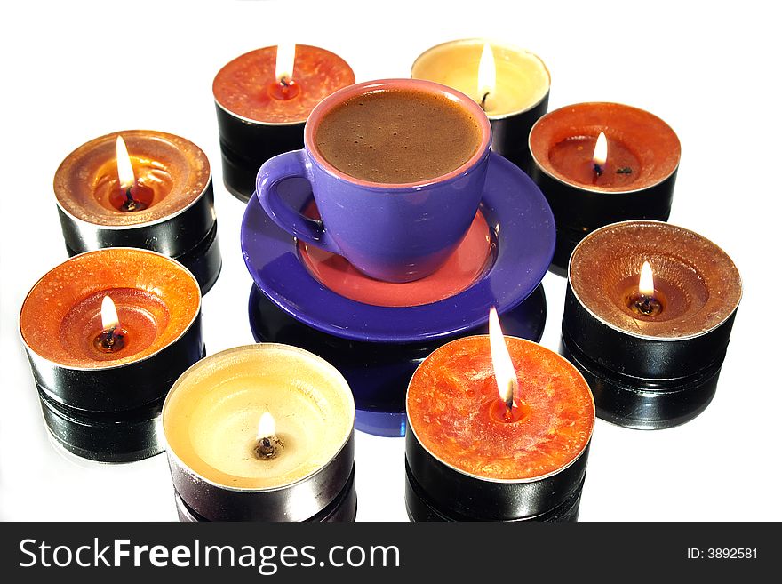 Cup of coffee and candles