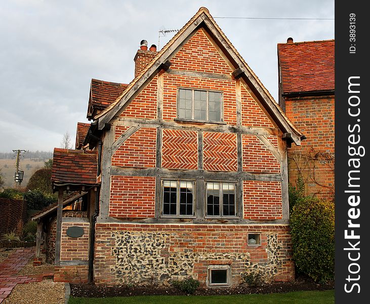 Traditional Timber Framed English Village Cottage with Herringbone brickwork
