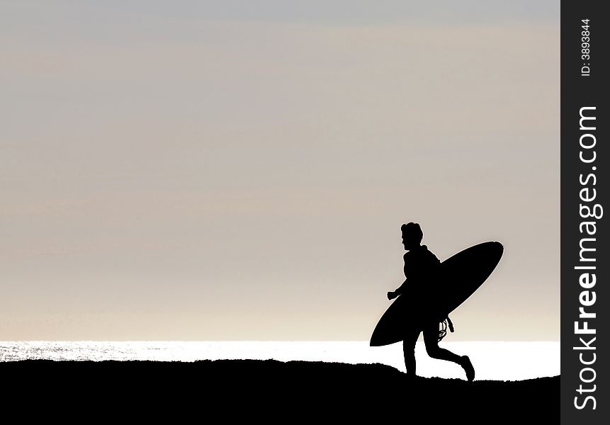 Surfer Running Along Cliff