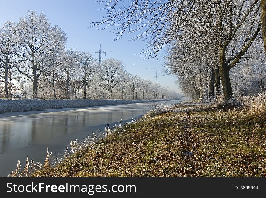 Winder wonderland water blue sky background. Winder wonderland water blue sky background