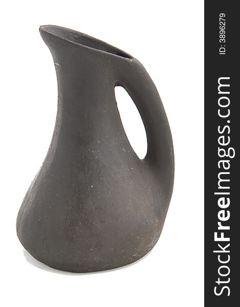 Clay black jug for milk isolated on white