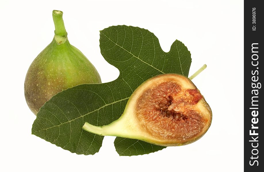 Fruits of fig - tree isolated on white background. Fruits of fig - tree isolated on white background