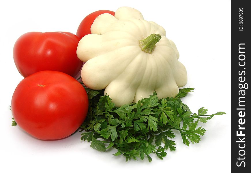 Tomatoes, cymbling and parsley on white background