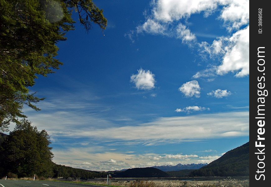 The road to Milford is one of New Zealandâ€™s most scenic drives. The first part is relatively mild farmland, then youâ€™ll ease into beech forest near the entrance to the Fiordland National Park. Look for the Avenue of the Disappearing Mountain and the Mirror Lakes.
Beautiful Milford Sound, described by Rudyard Kipling as the â€™eighth wonder of the worldâ€™. A cruise on Milford Sound will be an essential component of your time in Fiordland, or you can get up close and personal in a sea kayak. Tall waterfalls, vertical rock faces and seals are some of the things youâ€™ll remember