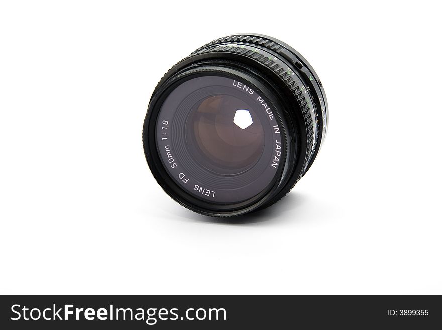 Isolated view of a 50mm camera lens