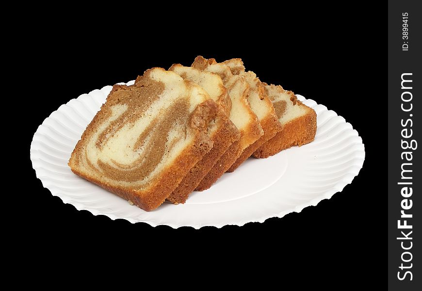 Several slices of cinnamon swirl bread on a paper plate. Several slices of cinnamon swirl bread on a paper plate