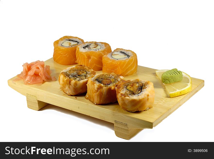 Roll sapporo maki on the japanese dish isolated on a white background.