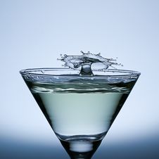 Splash Water Isolated On The Champagne Glass. Royalty Free Stock Images Splash Water Isolated On The Champagne Glass. Royalty Free Stock Images