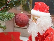 Santa Claus And Ornamental Ball Royalty Free Stock Photo Santa Claus And Ornamental Ball Royalty Free Stock Photo