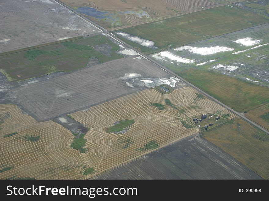 Aerial view of patterns in Saskatchewan fields in spring. Aerial view of patterns in Saskatchewan fields in spring.