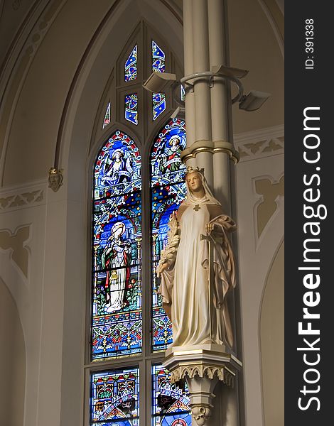 Stock photograph of the interior statuary at a small catholic basilica. Stock photograph of the interior statuary at a small catholic basilica