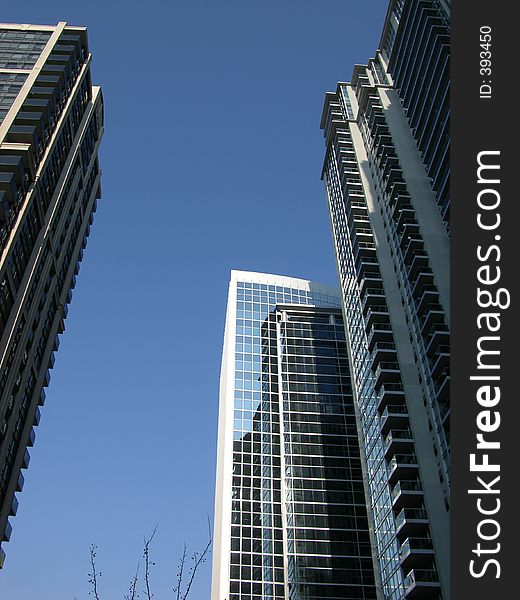 Condos and highrises crowd this street. Condos and highrises crowd this street.