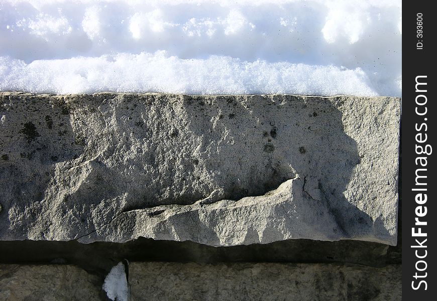 Concrete ledge after a new snowfall. Concrete ledge after a new snowfall.