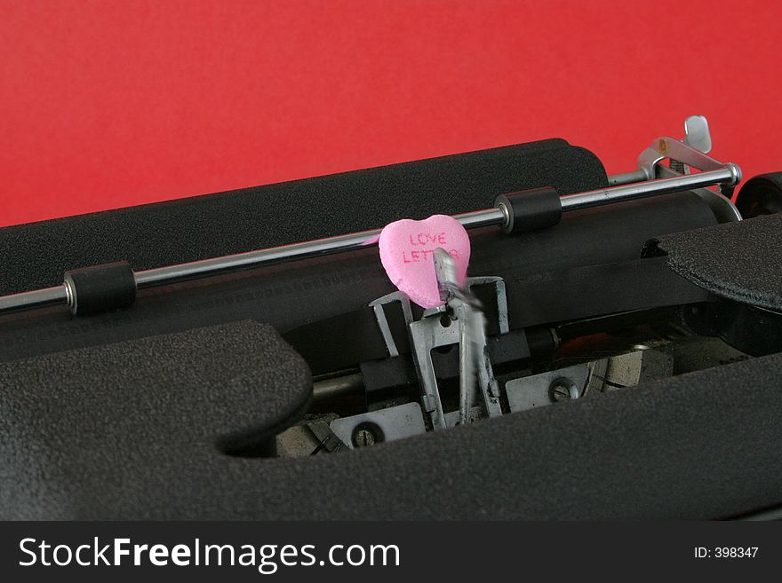 An old-fashioned typewriter delivers a whimsical, romantic, timeless love letter. An old-fashioned typewriter delivers a whimsical, romantic, timeless love letter.