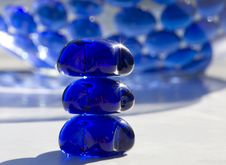 Sunlit Beads On White Table Royalty Free Stock Photo Sunlit Beads On White Table Royalty Free Stock Photo
