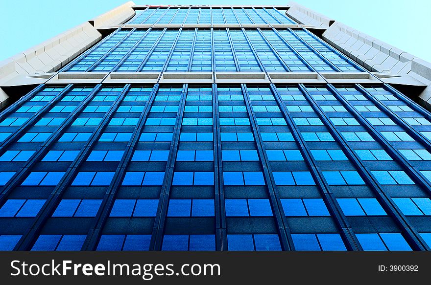 A tall city building in vivid colours. A tall city building in vivid colours