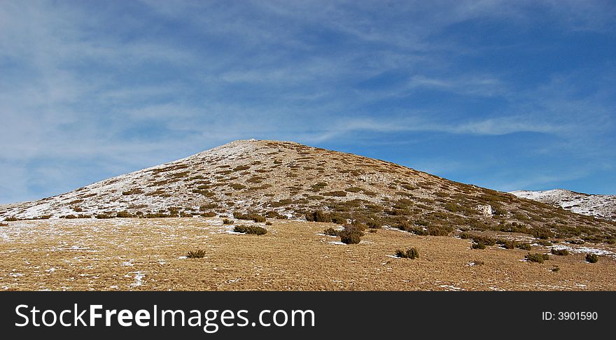 Winter scenery with distant ridge