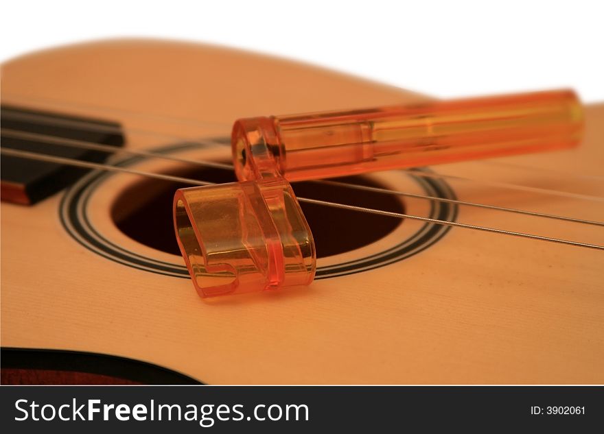Ukulele a-small acoustic guitar. It is isolated on a white background