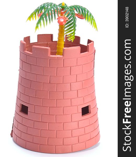Children's toys. The tower and palm trees. Palma is growing in the tower. Symbol of peace in Africa. Isolated on a white background. Children's toys. The tower and palm trees. Palma is growing in the tower. Symbol of peace in Africa. Isolated on a white background.