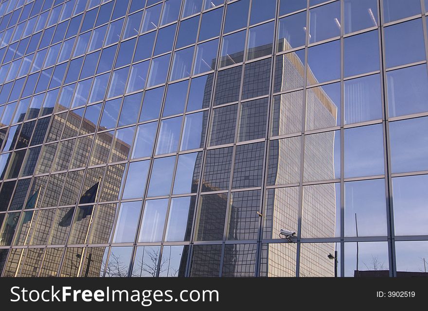 Modern skyscraper with reflections in windows