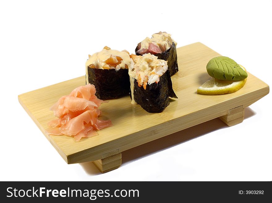 Sushy on the japanese dish isolated on a white background.