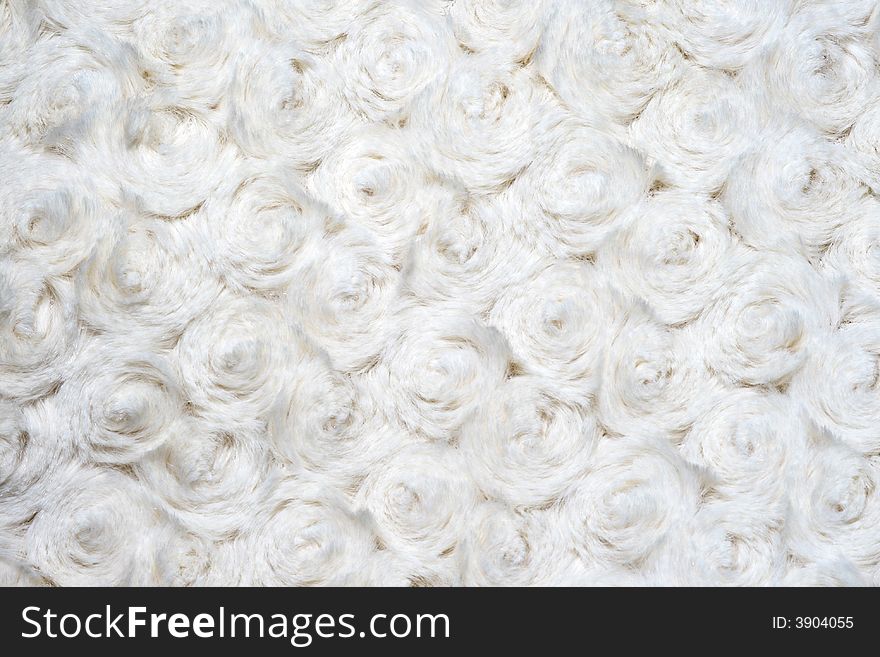 A white woolwork flower paint. A white woolwork flower paint