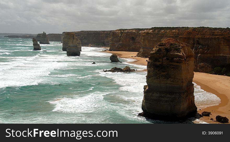 Lime stone coast showing rock stack named, the twelve apostles in Victoria, Australia. Lime stone coast showing rock stack named, the twelve apostles in Victoria, Australia