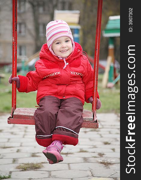 Girl on the swings