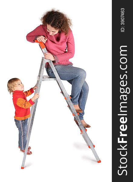 Mother and daughter on  stepladder on white