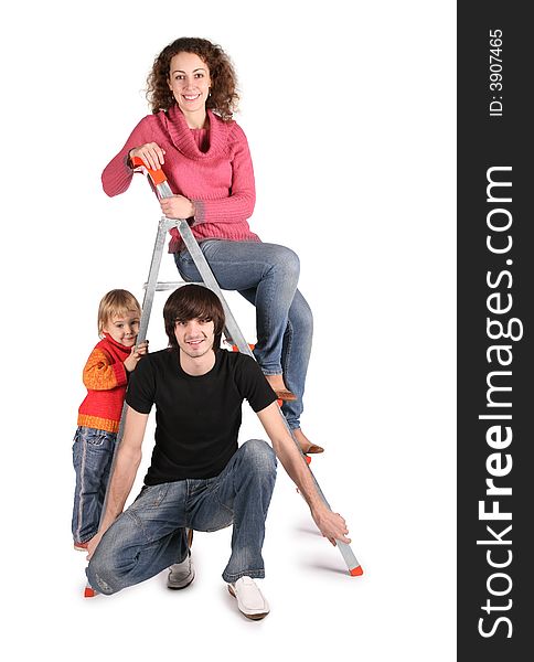 Family on the stepladder on the the white