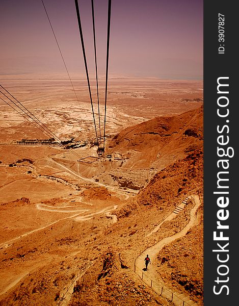 Cable to Masada, Judean Desert, Israel. The Dead Sea is in the background.