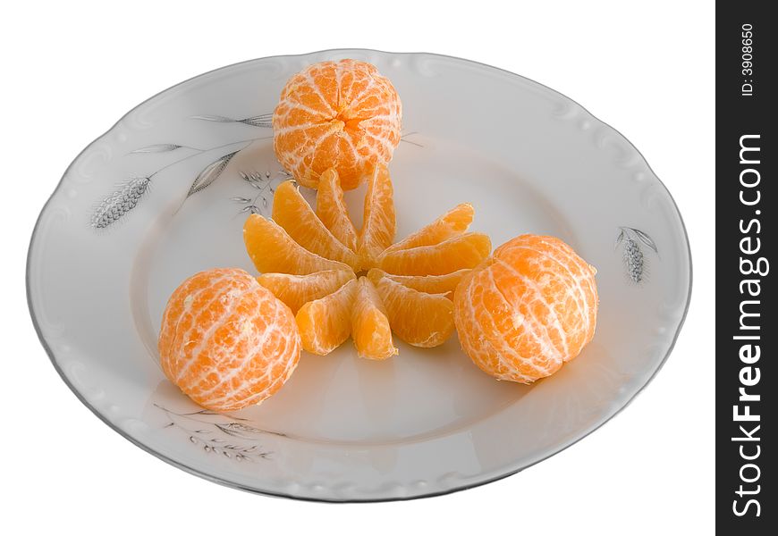 Peeled tangerines on plate isolated on white