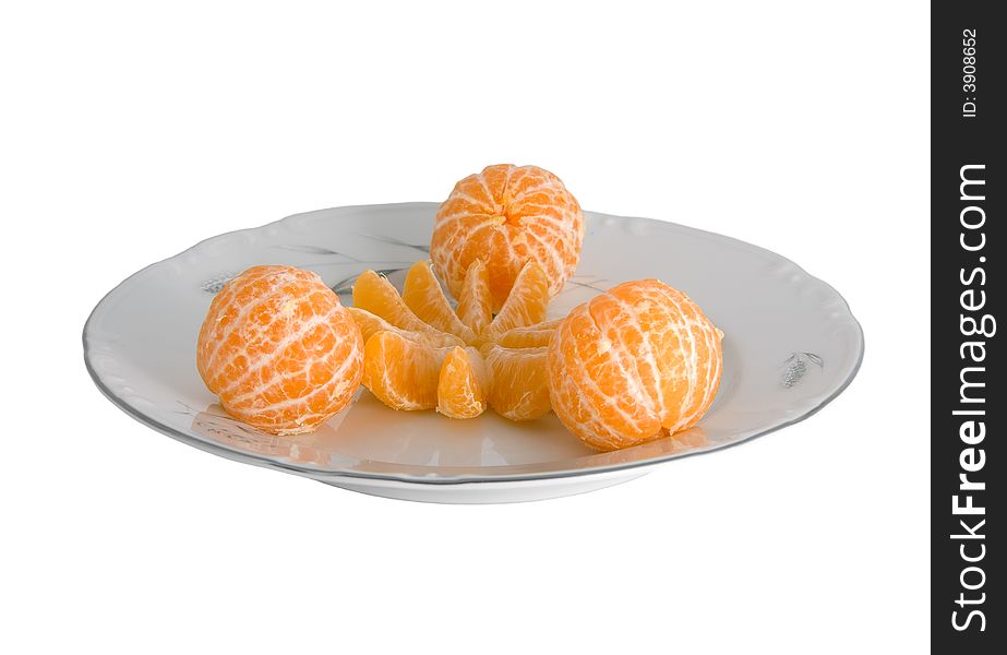 Peeled tangerines on plate isolated on white