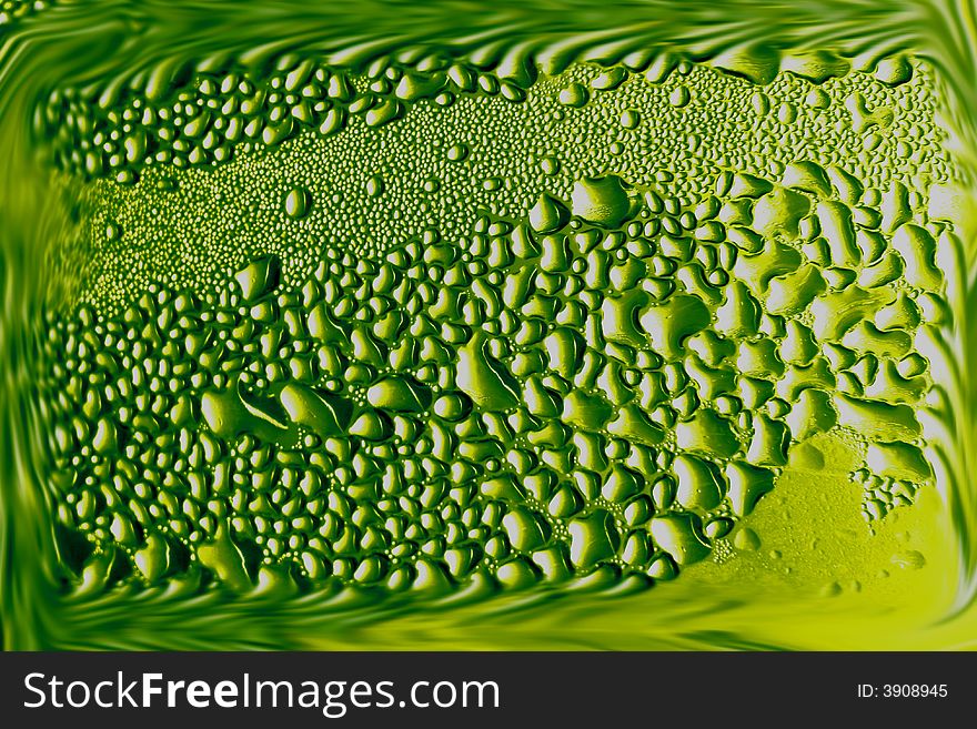 Drop of water on a green background